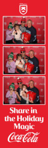 3 panel print photo booth picture of a family posing with props in the Coca-Cola Killington branded backdrop photo booth with a Share in the Holiday Magic frame