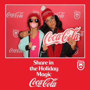 Gif of a mother and daughter posing with Coca-Cola props on a Coca-Cola Killington branded backdrop photo booth with a Share in the Holiday Magic frame