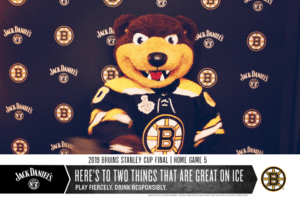 Gif of Bruins mascot in the Jack Daniel's/Bruins branded backdrop photo booth
